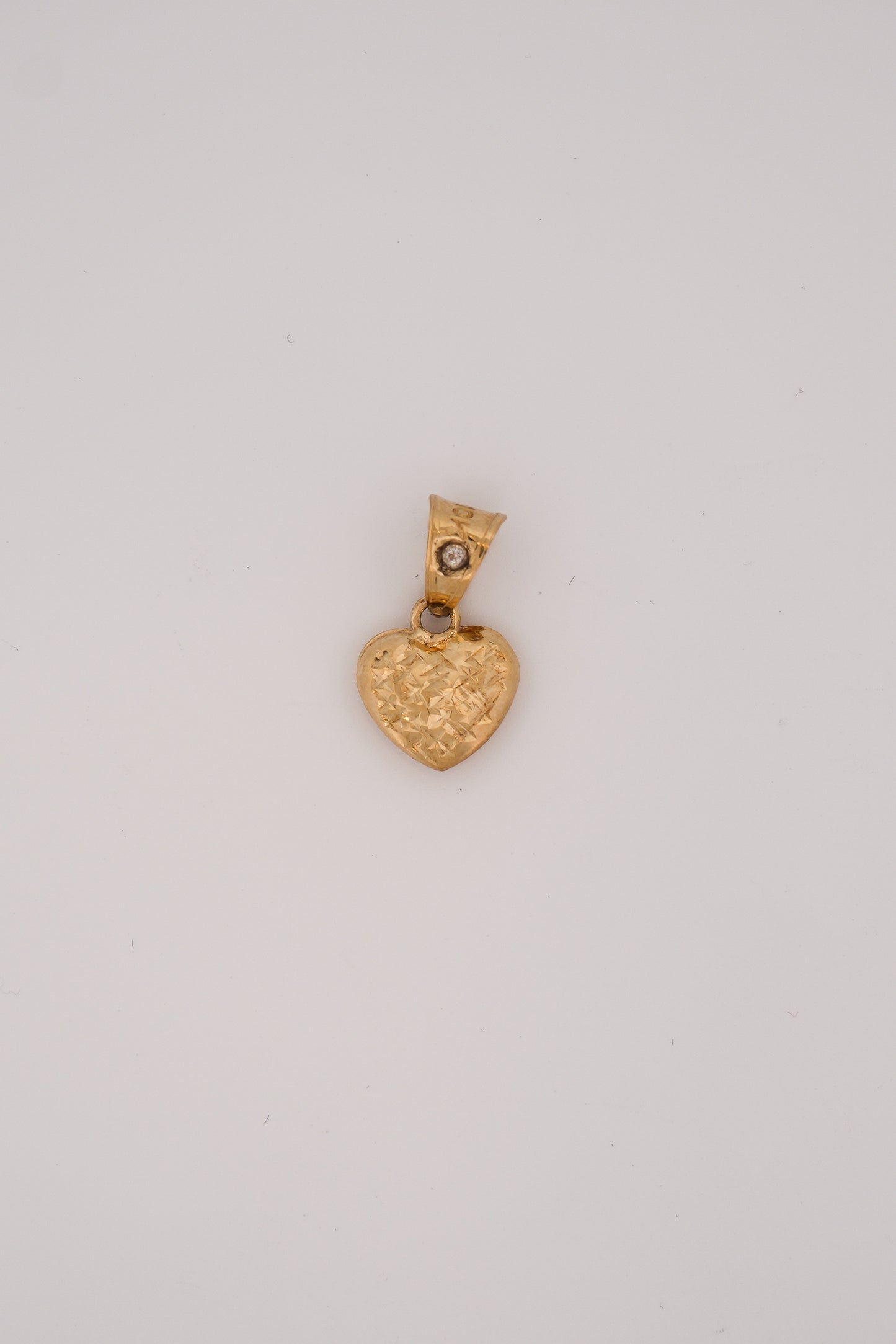 10k Gold Diamond Cut Heart Pendant