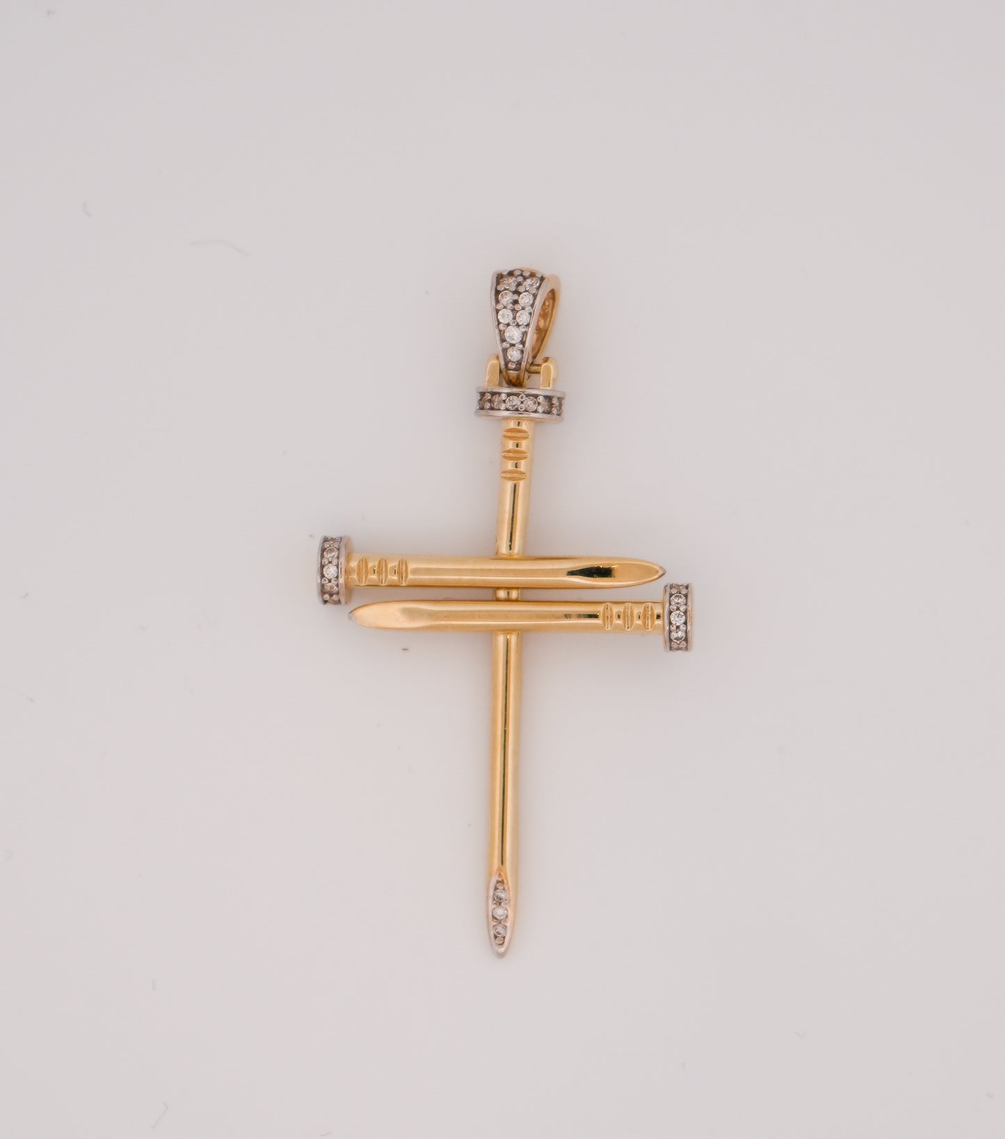 10k Gold CZ Stones Nail Cross Pendant